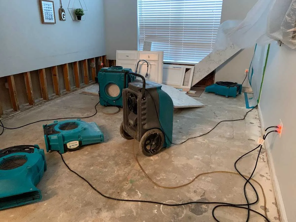 Dehumidifier in flood-cut room for Water Damage Restoration in Hopedale